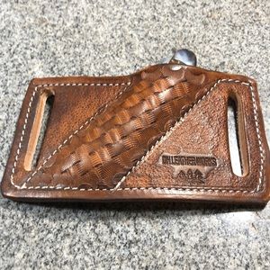 Pancake holsters for folding edged tools